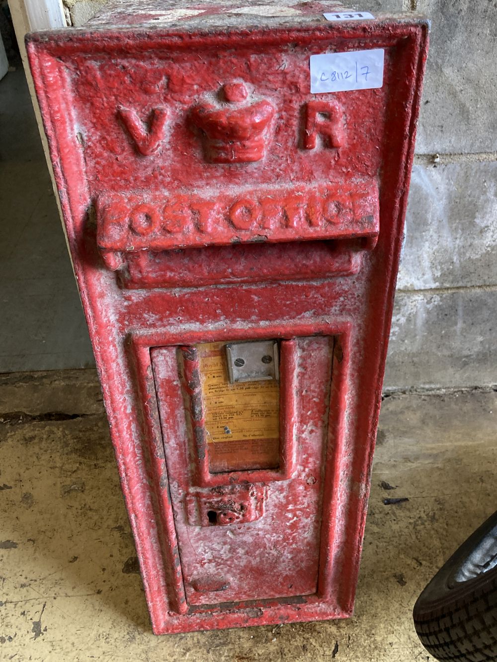 A Victorian cast iron postbox, width 26cm, depth 32cm, height 71cm